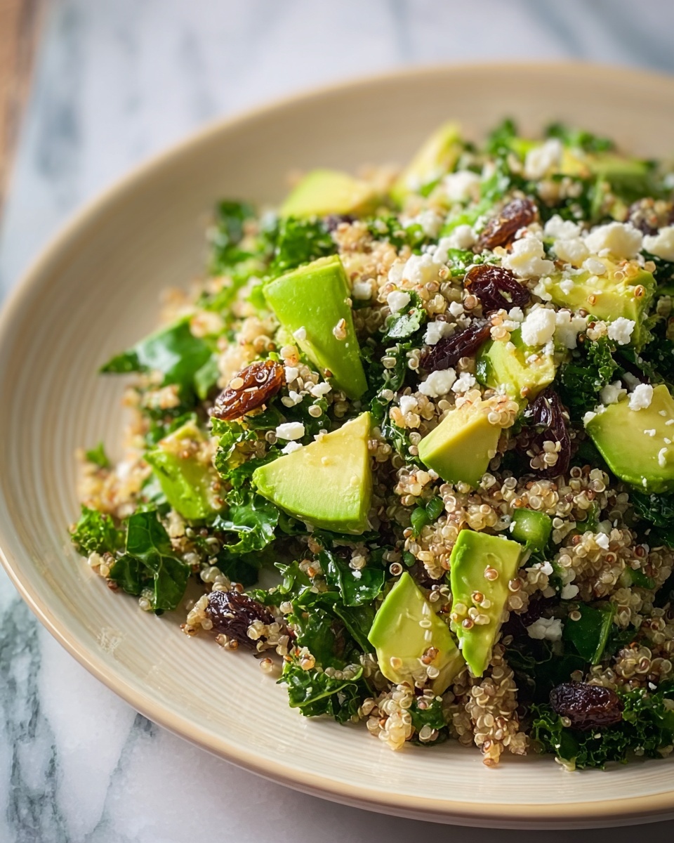 Quinoa Salad with Shredded Greens, Raisins, and Lemon Dressing Recipe - Recipe Image