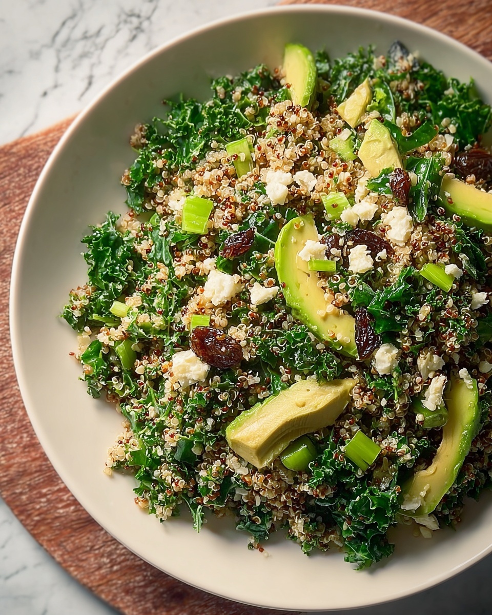 Quinoa Salad with Shredded Greens, Raisins, and Lemon Dressing Recipe - Recipe Image