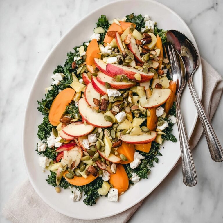 Healthy Kale Salad with Persimmons, Pear, Goat Cheese, and Nuts Recipe