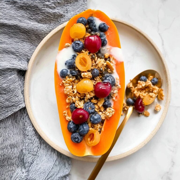 Papaya Yogurt Bowl with Granola, Berries, and Honey Recipe