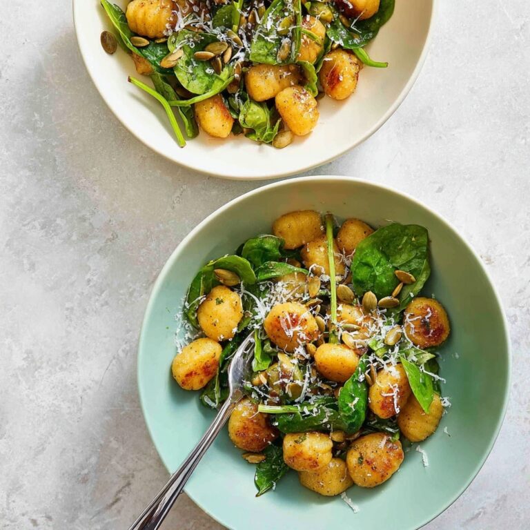 Cauliflower Gnocchi with Pesto, Spinach, and Nut Topping Recipe